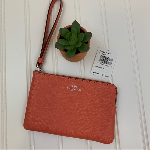 New! Coral leather wristlet from Coach - Picture 1 of 5